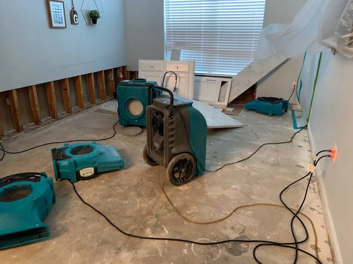 Dehumidifier in flood-cut room for Water Damage Restoration in Groton